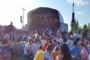 Crowds take up their position for Razorlight on the main stage on Sunday