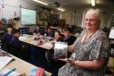 27P10..Mrs. Higginson wins teaching award - with her year 5 class..Nascot Wood Junior School.