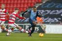Jay Simpson in action against Doncaster Rovers at the weekend. Picture: Simon O'Connor