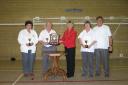 Upshire Bowls Club receive their winner's trophy from Cllr Anne Grigg