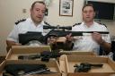 Chief Insp Pete Dickson and Insp David Hay with part of the haul from the Redbridge amnesty