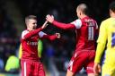 Dean Cox and Jimmy Smith celebrate against Bury: Simon O'Connor