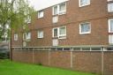 The rear of the block of the flats on the notorious Ninefields estate in Waltham Abbey where a woman jumped from the first floor to escape an armed burglar
