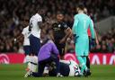 Dele Alli receives treatment following Raheem Sterling's challenge. Picture: Action Images