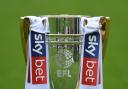 The League Two trophy will be handed to Swindon. Picture: PA Wire