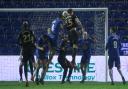 West Ham United's Craig Dawson scores his side's first goal of the game during the Emirates FA Cup third round match at Edgeley Park, Stockport.