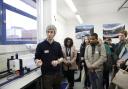 Dr Alex Henshaw, Deputy Head of Queen Mary’s School of Geography, pictured with students working on the Blue Green E17 project