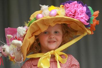 Children take part in an Easter Bonnet parade at Abridge Pre-School. (07/04/2011) EL24993-5