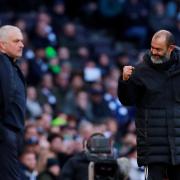 Contrasting emotions: Jose Mourinho looks out at the pitch as Nuno Espirito Santos celebrates. Picture: Action Images