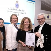 Asra Farid. Ayesha Lawrence and Jacqui Foile from VAEF collect their award from the High Sheriff of Essex