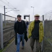 John Rogers, pictured left, walked 35 miles around London Overground line for his new documentary.