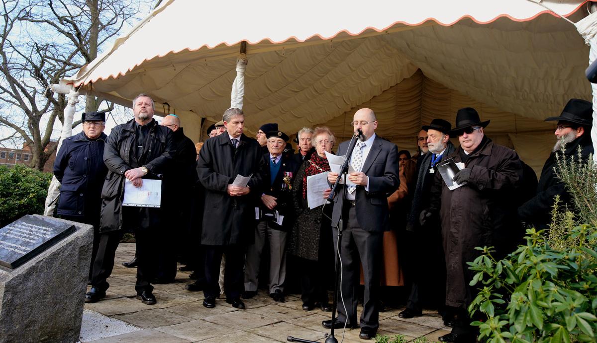 People of  multi faiths gather to remember victims of holocaust atrocities past and present