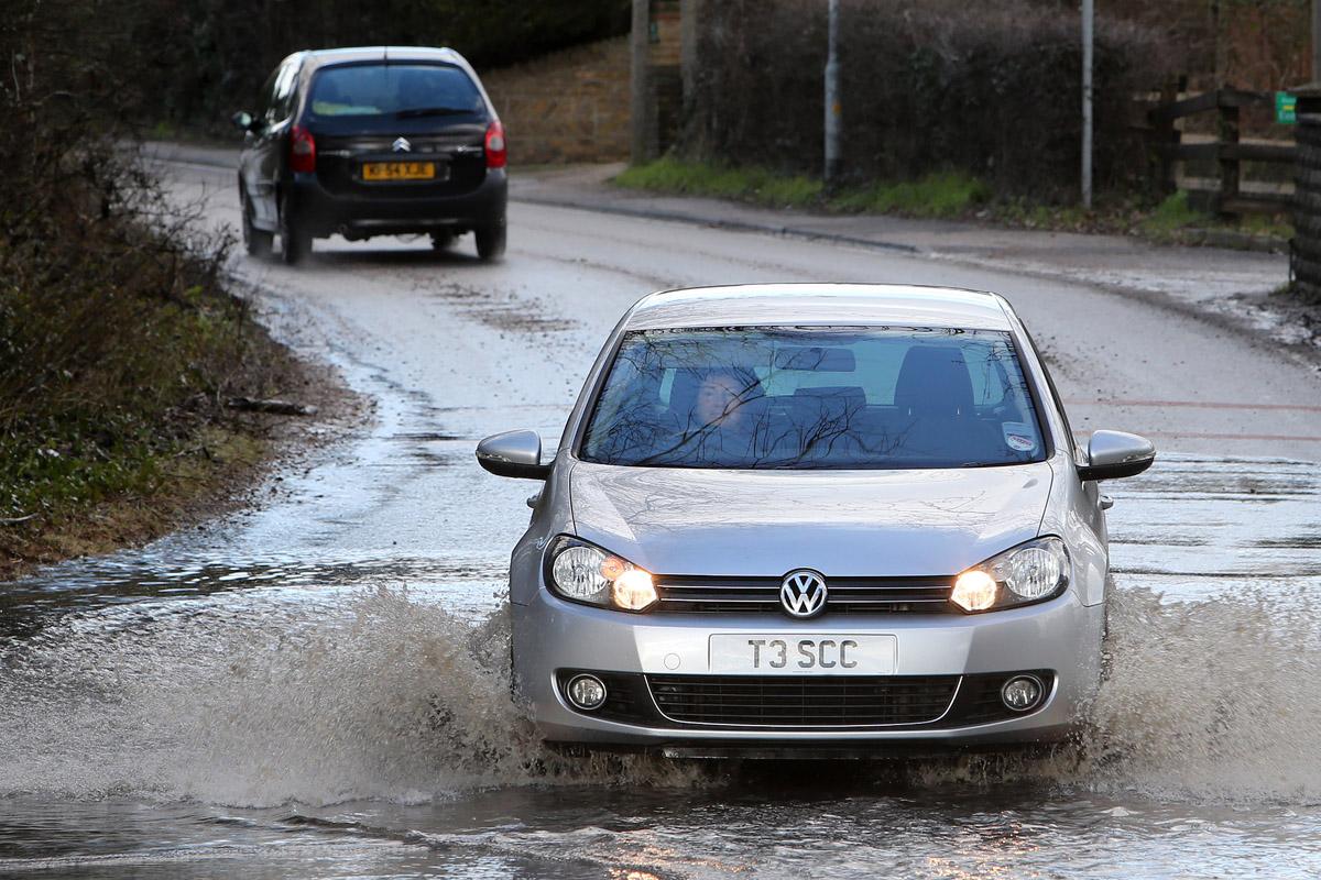 Flooding on the B181 Epping Road at the junction of Common Road. Jack's Hatch. (7/2/2013) EL75097_1