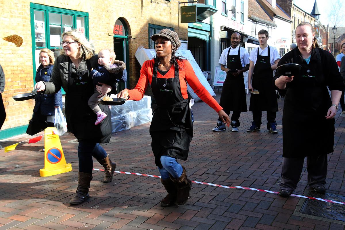 Pancake Races, outside Waltham Abbey Library, Sun Street, Waltham Abbey. (4/3/2014) EL75453_5