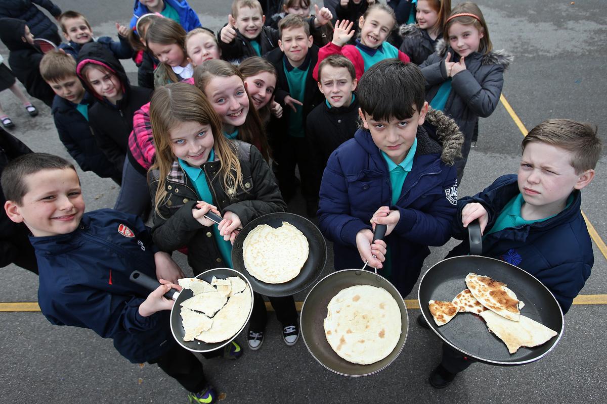 Children at Shelley Primary School flip pancakes, Milton Crescent, Ongar. (4/3/2014) EL75593_1
