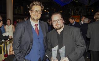 Charles Thomson, holding his two awards, with former Newsquest reporter Ellis Whitehouse, who was the runner-up in the Weekly Reporter of the Year category