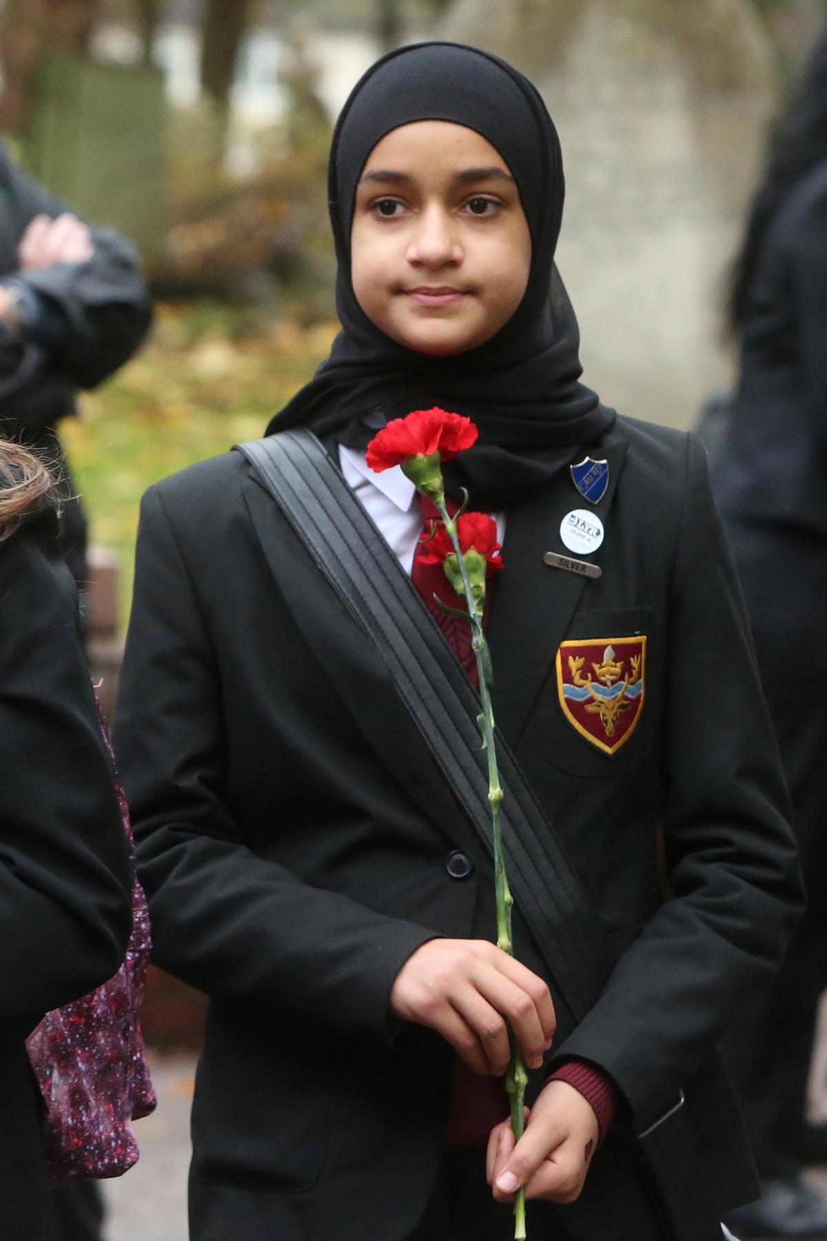 British Legion Remembrance Service at Chingford Mount Cemetery, children from Chingford Foundation, Parkside, Rushcroft and Chace Community from Enfield placed flowers over 200 graves. (6/11/2015) EL86105_5