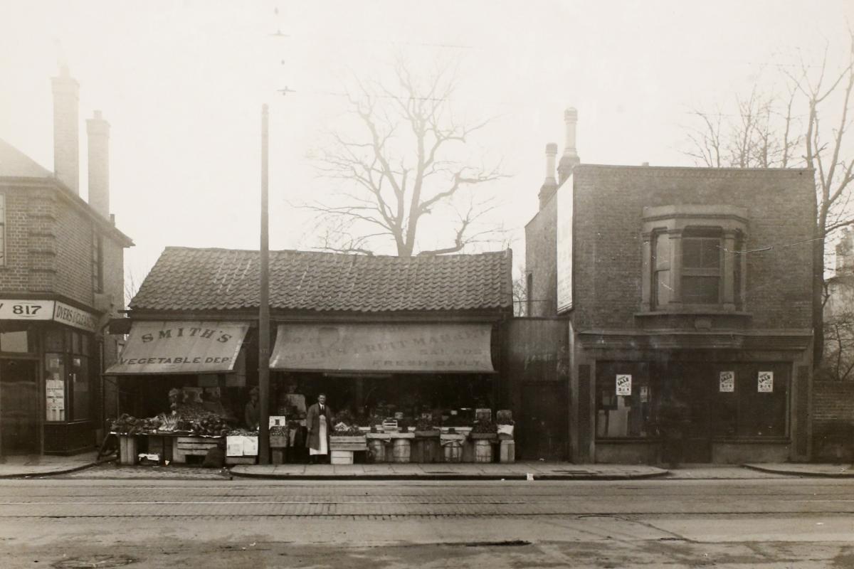 Leyton High Road, two old buildings that made up a shoeing forge, demolished in 1932 for swimming baths (Picture: Vestry House Museum archive)