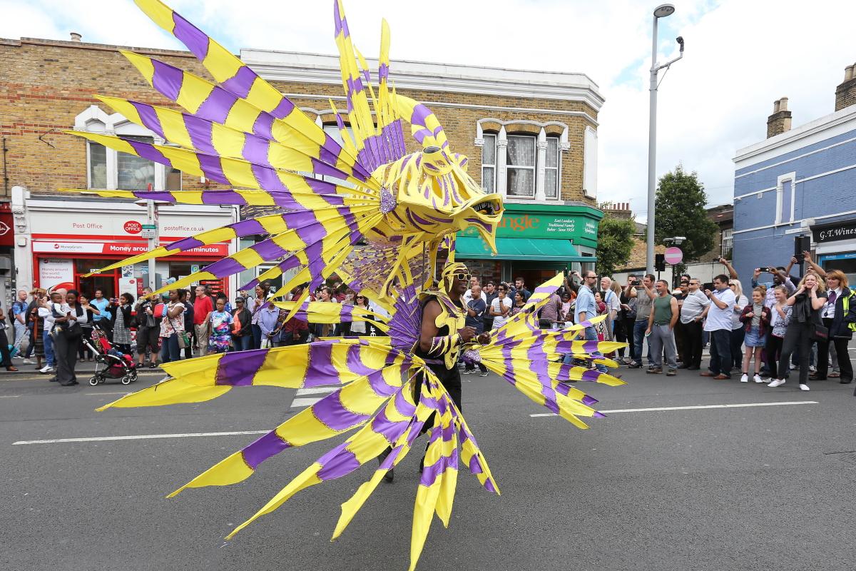 Rio-themed youth carnival procession makes its way along Leyton High Road during the Leyton Get Together. (3/7/2016) EL87718
