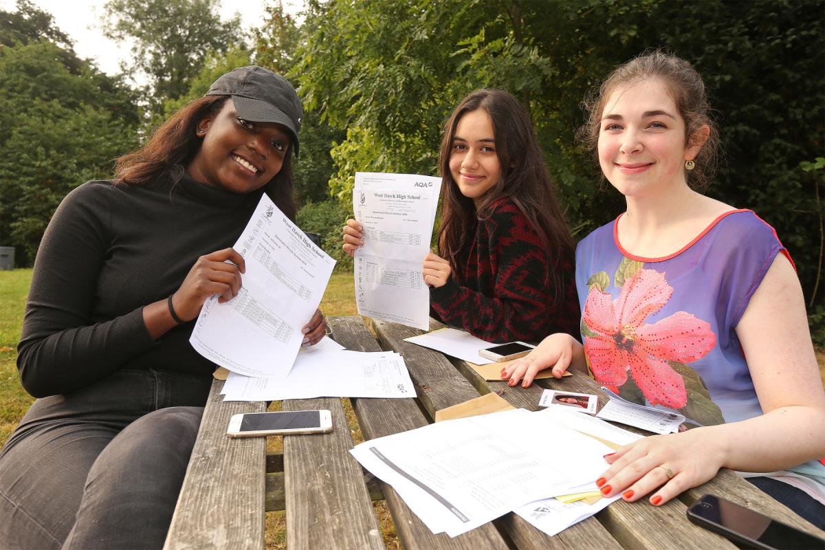 Jemimah Ali, Sharna Ahmed and Ella Sabine. A Level results day at West Hatch High School, Chigwell. (18/8/2016) EL89030_10