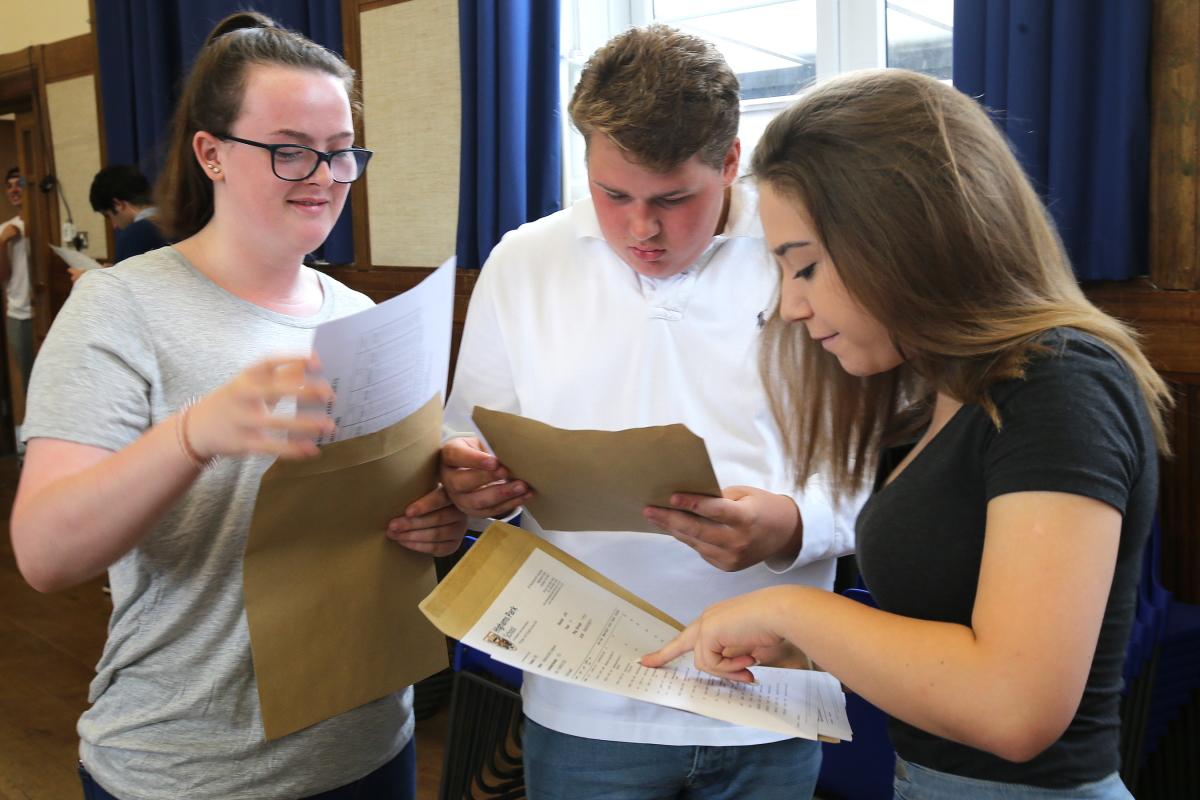 Students collect GCSE results at Highams Park School. (25/8/2016) EL89056_