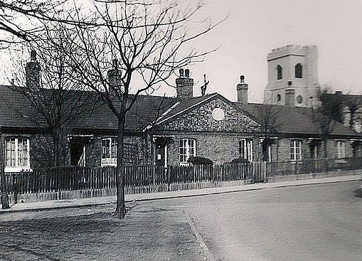 The almshouses pictured in the 1940s