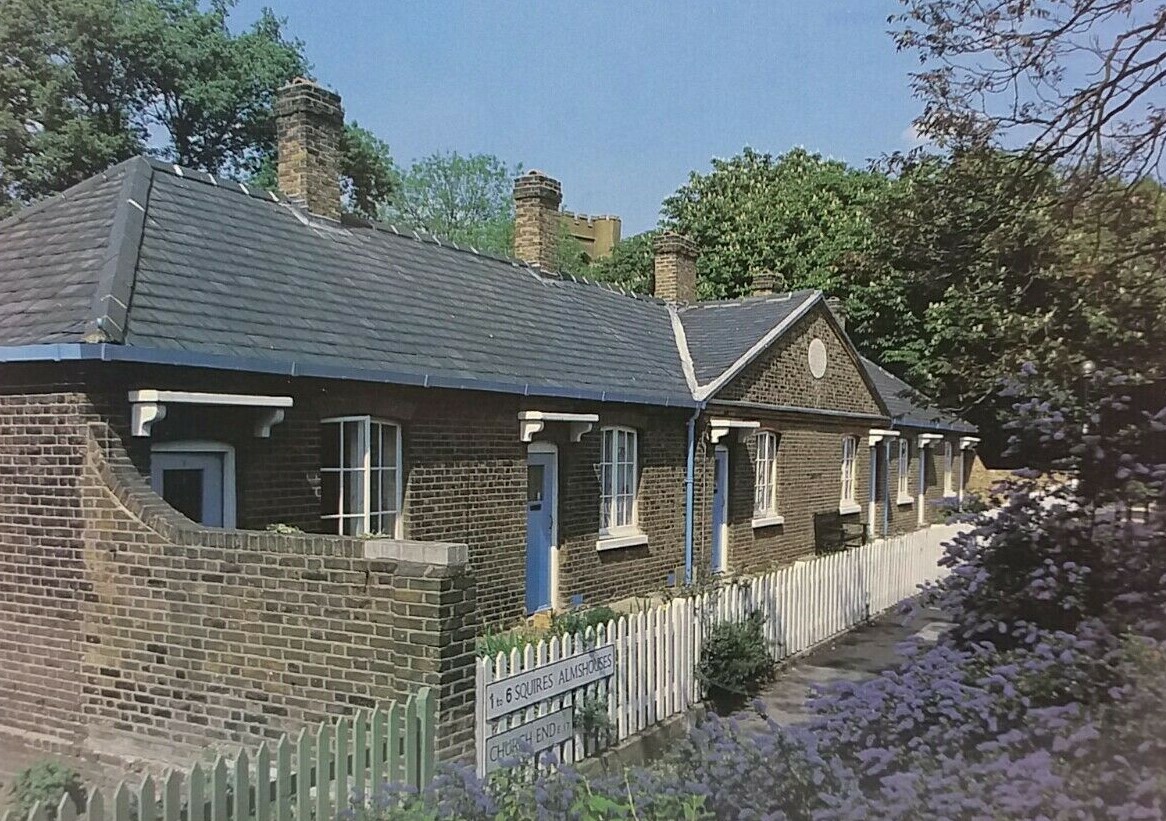 A postcard image of the almshouses from the 1990s