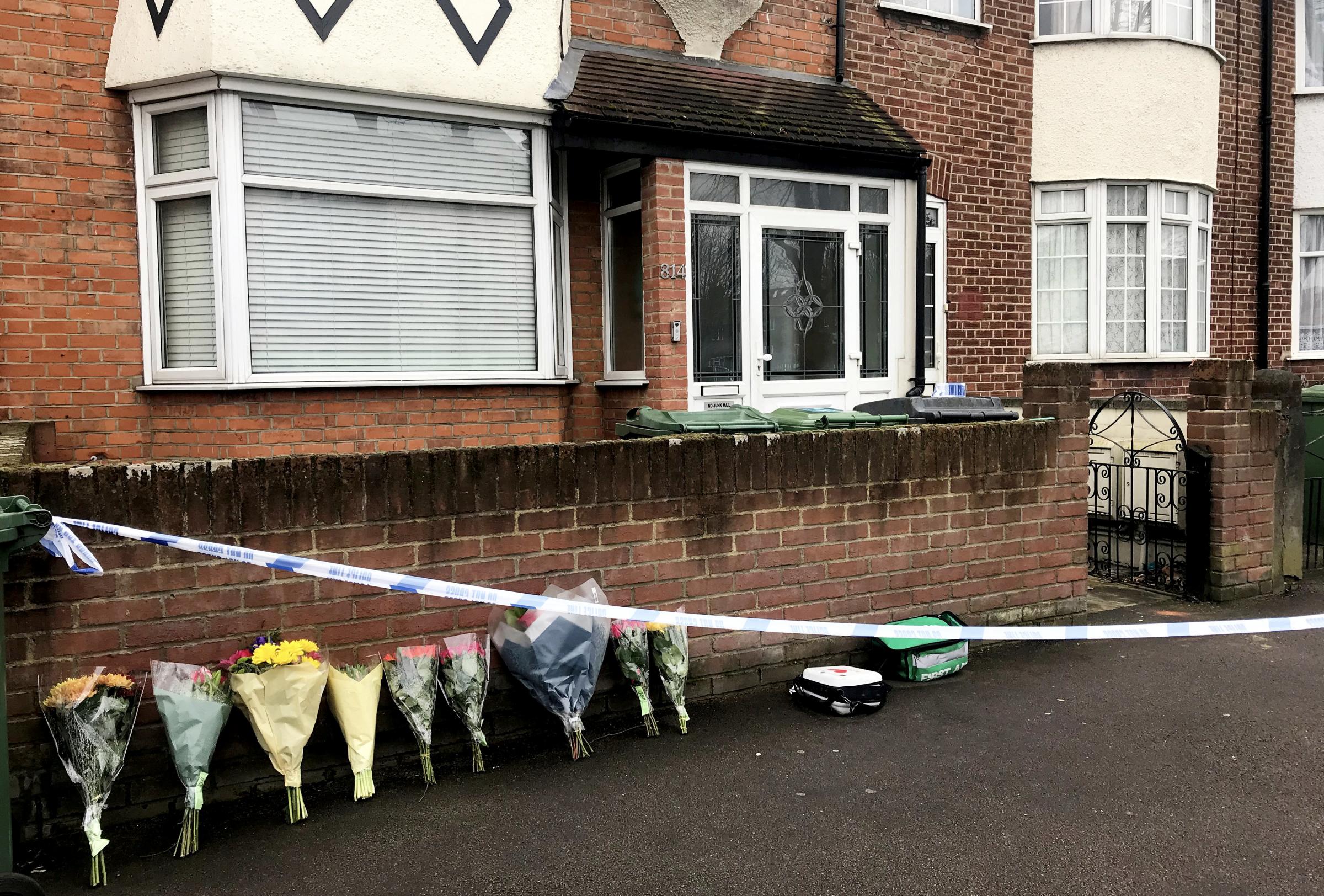 A neighbour described seeing the attacker punched in the face before he grabbed the jacket while holding a knife covered with blood and fled across a rooftop. Photo SWNS