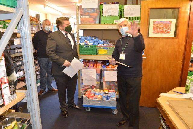 Watford MP Dean Russell pictured with Watford foodbank manager Andrew Tranter at the foodbank earlier this year