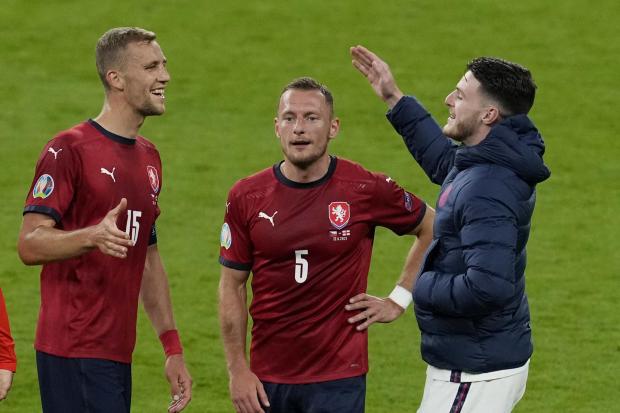 Declan Rice greets West Ham teammates Tomas Soucek and Vladimir Coufal at full-time. Picture: Action Images