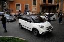The car carrying Pope Francis leaves the Gemelli Isola Tiberina Hospital (AP)