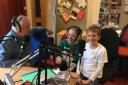 Siblings Beatrice and Henry Affleck taking up the role of radio DJ for a storytelling broadcast on the radio.