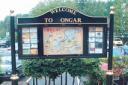OUT OF DATES: Ongar Town Forum's tourist information board opposite the town's library (E4973-1)