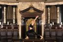 An instructor from Psychle London demonstrates Vinyasa Yoga in the temple