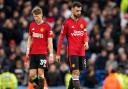 Scott McTominay, left and Bruno Fernandes (right) (AP Photo/Dave Thompson)