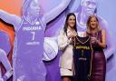 Caitlin Clark, left, poses for a photo with WNBA commissioner Cathy Engelbert after being selected first overall by the Indiana Fever during the first round of the WNBA draft (Adam Hunger/AP)