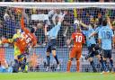 Luis Suarez palms the ball away in the dying moments of Uruguay's quarter-final clash with Ghana