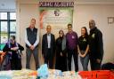 left to right: George Phillips, Tropical Sun commercial director, Sir Kenneth Olisa, foodbank founder Saira Begum Mir, Farooq Mir, and Emma Macorison and Paul Harrison from Tropical Sun