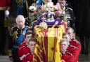 King Charles III and members of the royal family follow behind the coffin of Queen Elizabeth II as it is carried out of Westminster Abbey after her State Funeral. Image: PA