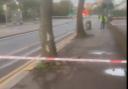 A screengrab of a video showing a police cordon in place