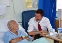 Jeremy Hunt checks up on a patient in an elderly ward visit