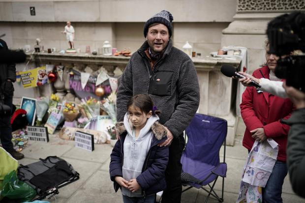 East London and West Essex Guardian Series: Richard Ratcliffe, the husband of Iranian detainee Nazanin Zaghari-Ratcliffe, with his daughter Gabriella, he is ending his hunger strike in central London after almost three weeks. Credit: PA