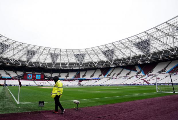 East London and West Essex Guardian Series: A general view of a steward by the pitch before the Premier League match at the London Stadium, London