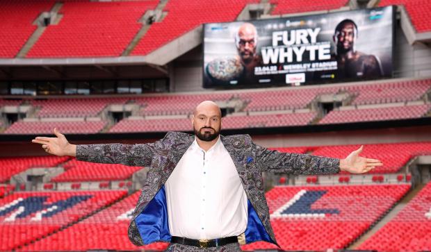 East London and West Essex Guardian Series: Tyson Fury poses on the pitch after the press conference at Wembley Stadium, London (PA)