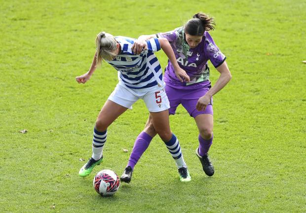 East London and West Essex Guardian Series: Reading's Gemma Evans (left) and Tottenham Hotspur's Rachel Williams battle for the ball during the Barclays FA Women's Super League match at the Select Car Leasing Stadium, Reading. Photo via PA/Bradley Collyer.