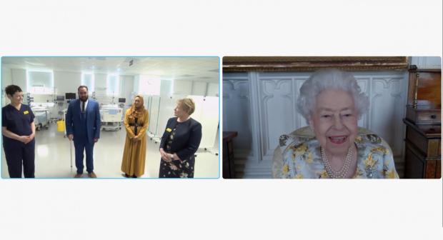 East London and West Essex Guardian Series: Queen Elizabeth II speaking to Dr Marie Healey, Divisional Director for Surgery and Critical Care; Mr Asef and Mrs Shamina Hussain; and Jackie Sullivan during a video link call (PA)