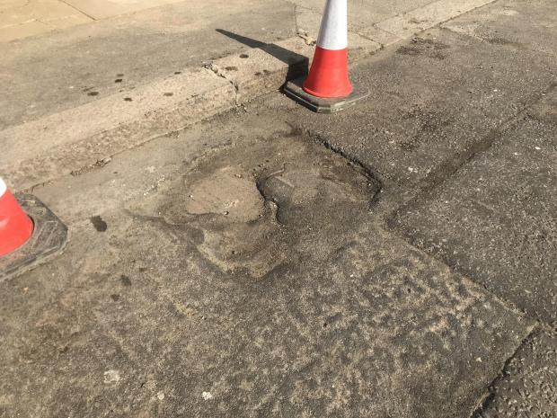 East London and West Essex Guardian Series: A dangerous pothole at Hanover Gardens. Image: David Martin