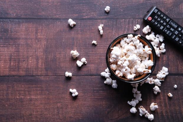 East London and West Essex Guardian Series: A bowl of popcorn and a TV remote (Canva)