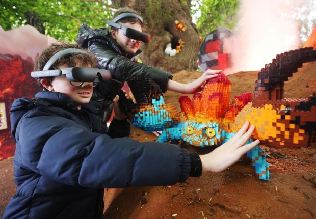 East London and West Essex Guardian Series: Lucca and Sonny using the eSight eyewear as they explored the Magical Forest (LEGOLAND Windsor)