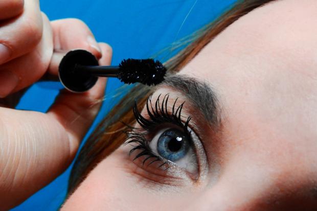 East London and West Essex Guardian Series: A woman putting on mascara. Credit: Canva